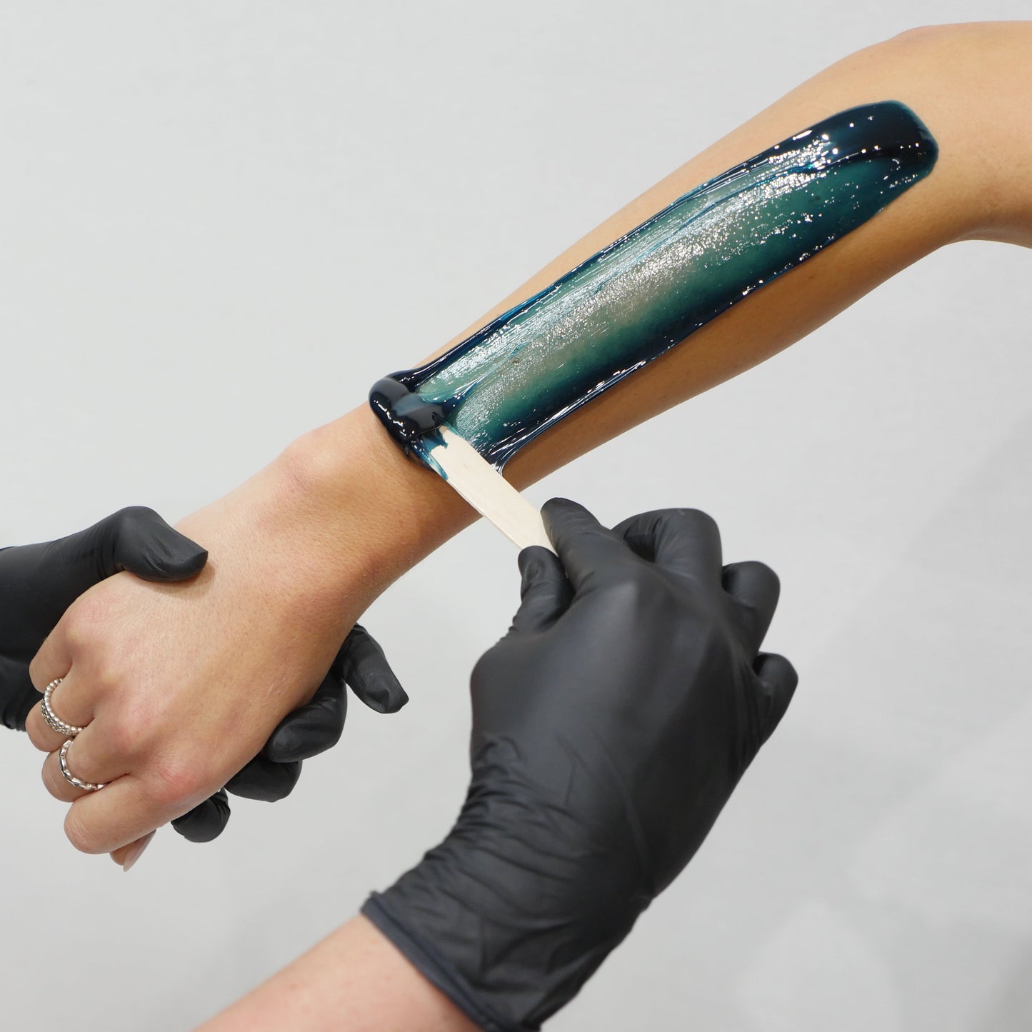 Caronlab Braziliant Film Wax removal demonstrating flexible strip-free waxing for professional salons.