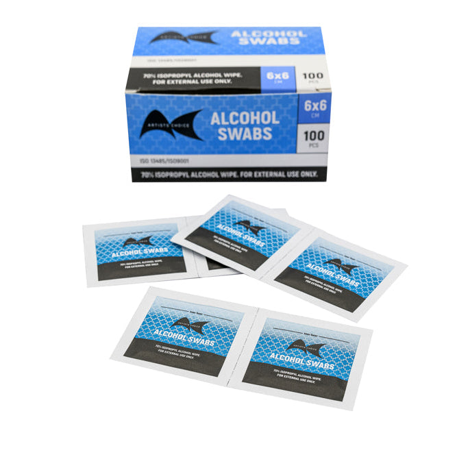 Box of alcohol swabs with individual packets on a white background