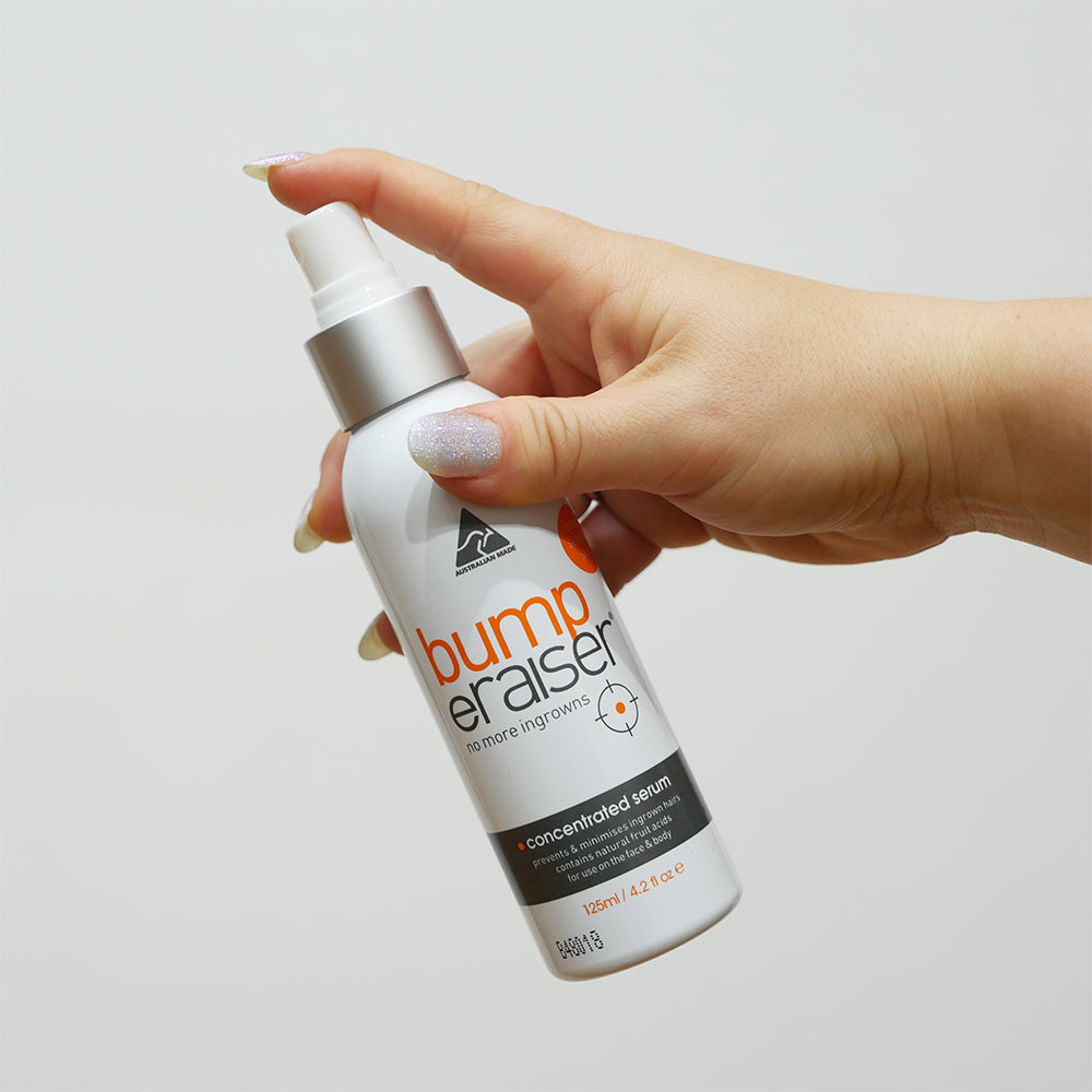 Bump eRaiser Concentrated Serum 125ml ingrown hair mist held by its pump applicator