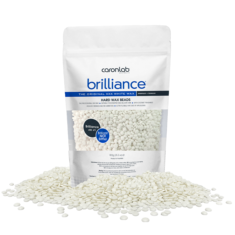 Caronlab Brilliance hard wax beads packaging with white wax beads on a white background