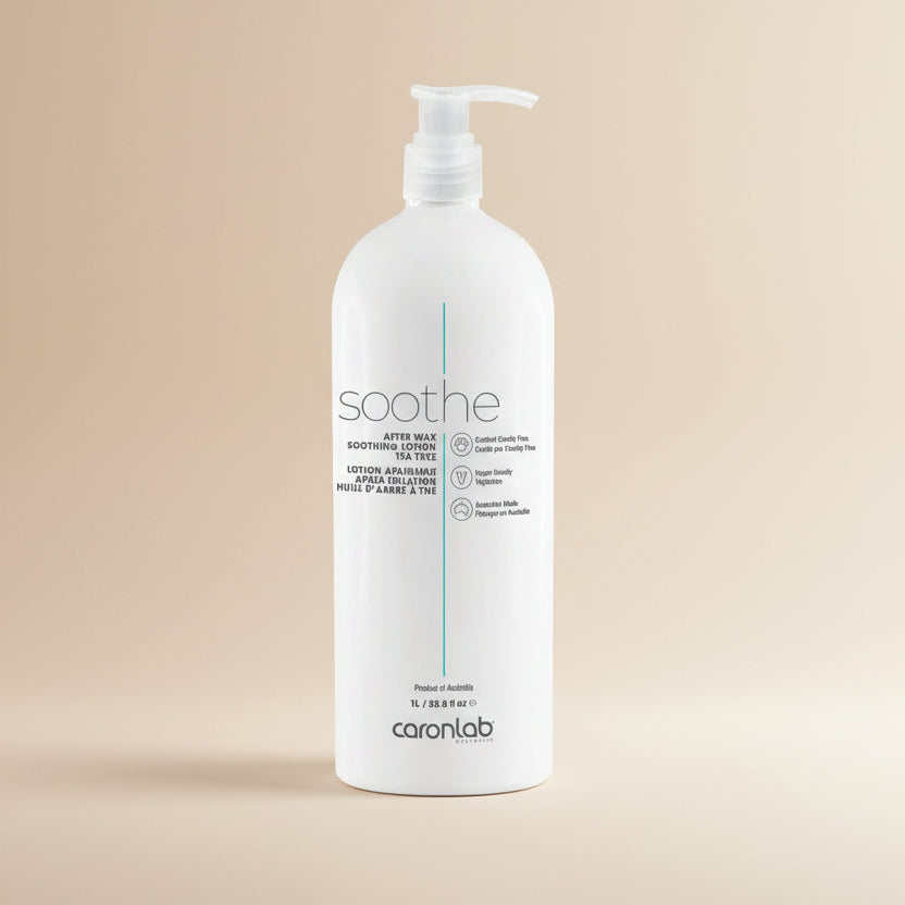 White bottle of Caronlab soothe after wax lotion on a white background