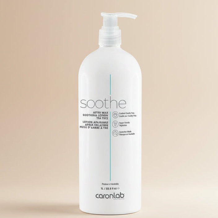 White bottle of Caronlab soothe after wax lotion on a white background