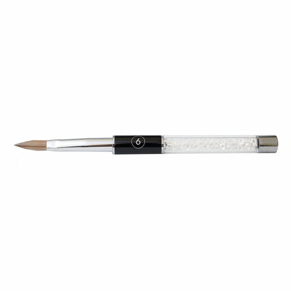 Acrylic nail brush with a black handle and silver ferrule on a white background
