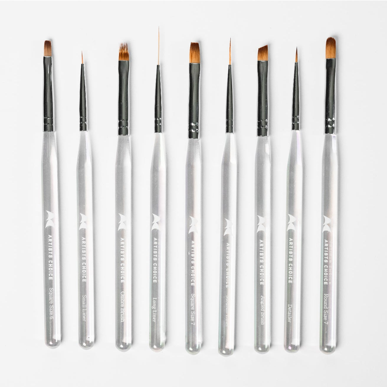 Set of makeup or nail art brushes on a white background