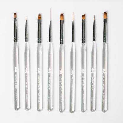 Set of makeup or nail art brushes on a white background