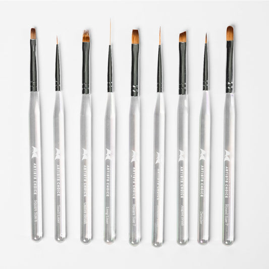 Set of makeup or nail art brushes on a white background