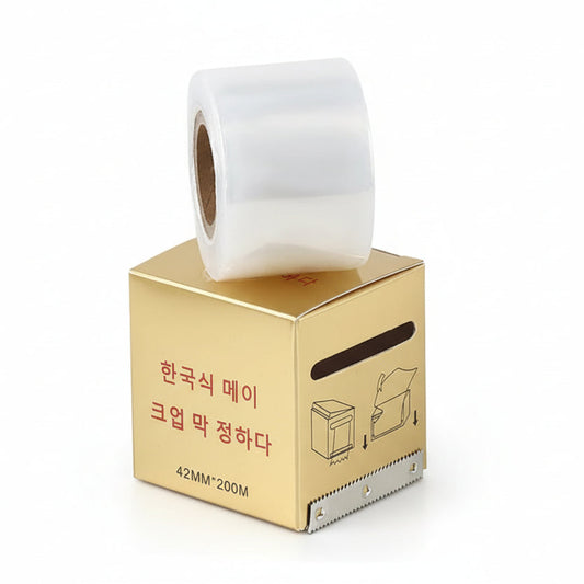 Disposable barrier film wrap roll with cutter for brow lamination and lash lift treatments