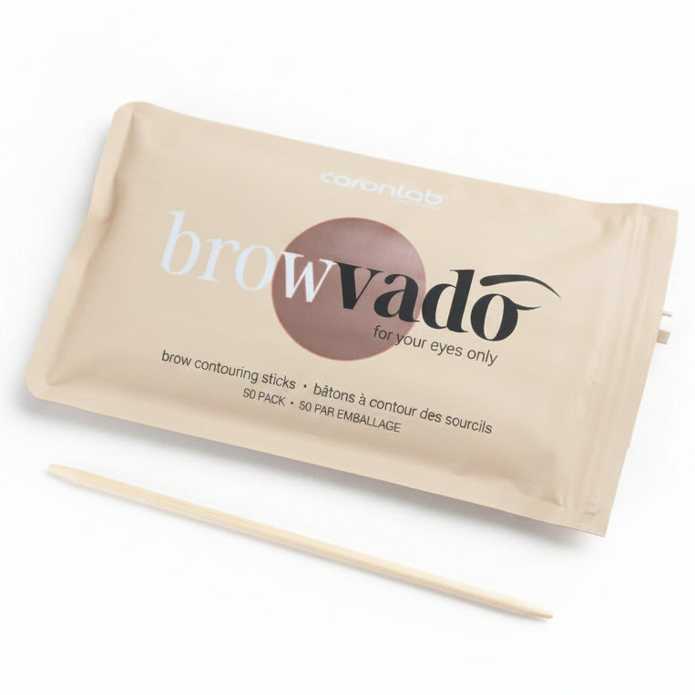 A package of covantlab browvado brow contouring sticks with a single white applicator spatula that is dual ended.