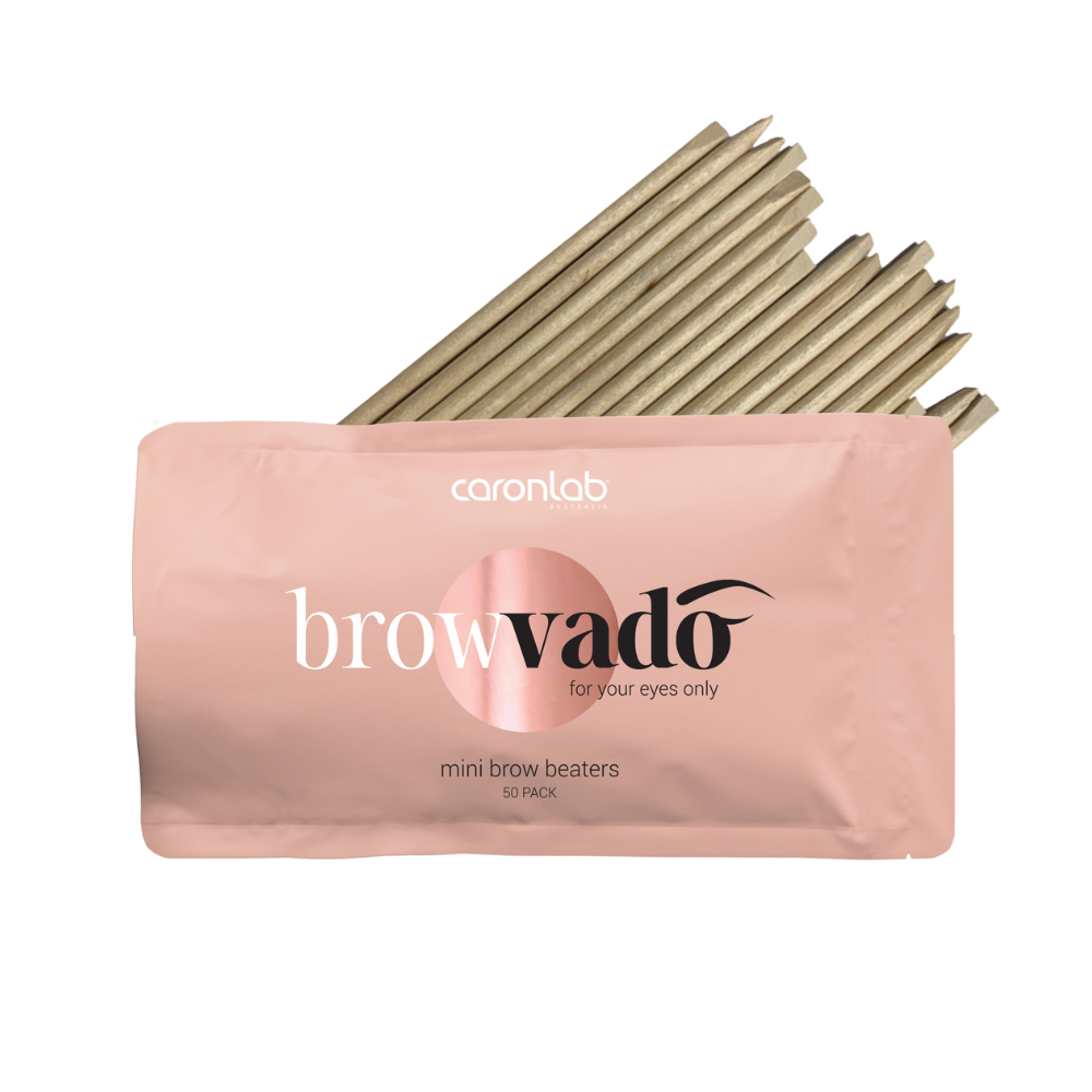 Pink packaging of browvado mini brow contouring beater sticks with visible brand name on a white background