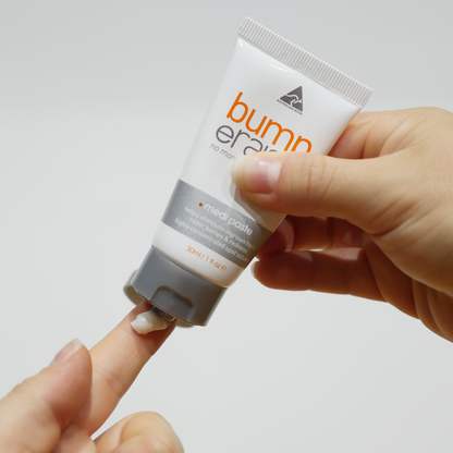 Bump eRaiser Medi Paste 30ml ingrown hair spot treatment applied to a fingertip