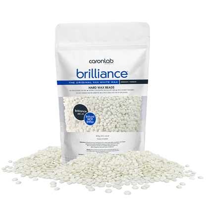 Caronlab Brilliance hard wax beads packaging with white wax beads on a white background