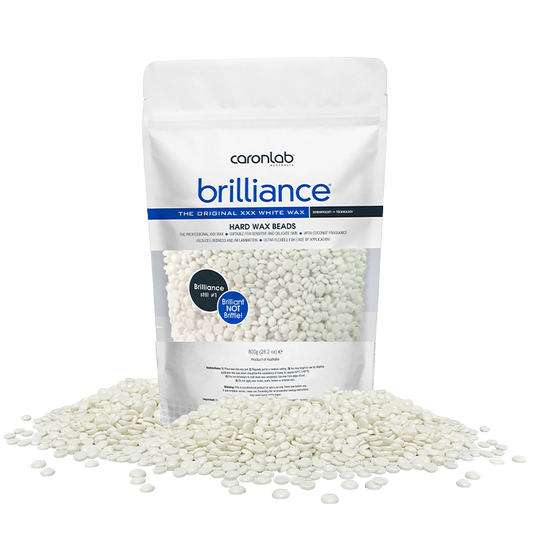 Caronlab Brilliance hard wax beads packaging with white wax beads on a white background