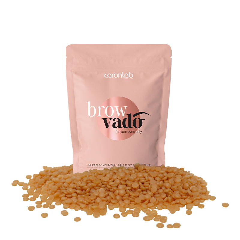 Caronlab brow vado product packaging with browngel wax beads on a white background