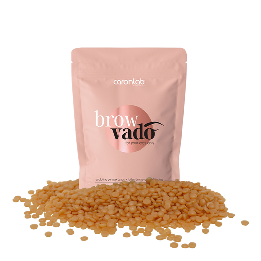 Caronlab brow vado product packaging with browngel wax beads on a white background