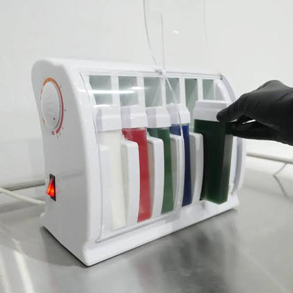 Caronlab mutli-cartidge wax heater lifestyle shot. Heater in use.