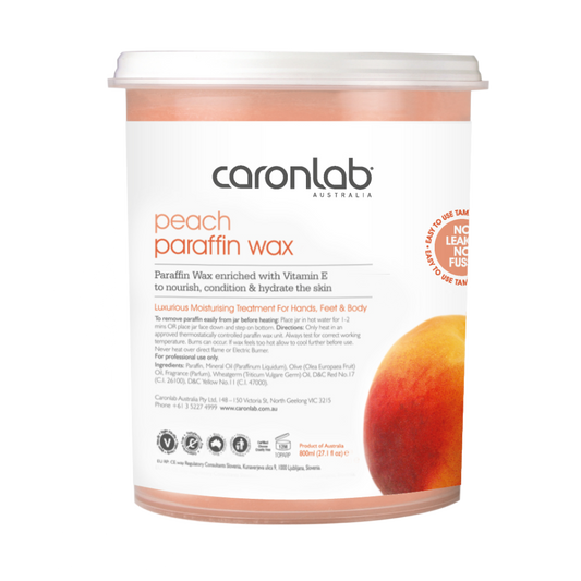Caronlab peach paraffin wax container on a white background