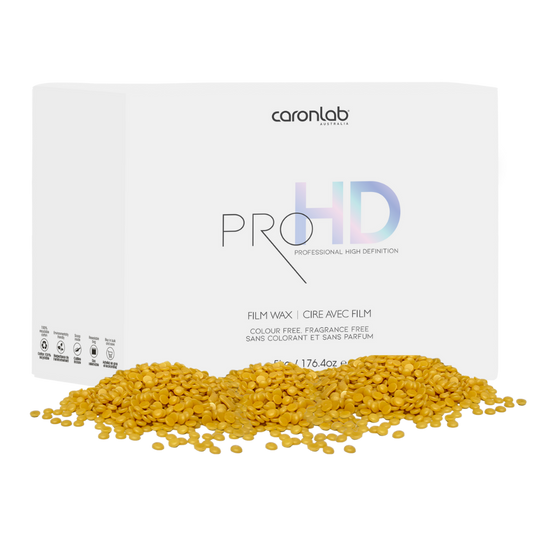 Caronlab Pro HD film wax 5kg box with  wax crystals on a white background