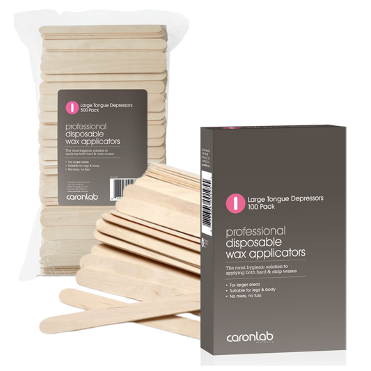 Pack of professional disposable wax large tongue depressor applicators with Caronlab packaging on a white background