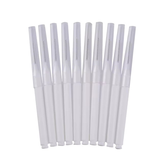 White disposable interdental lash and brow brushes with clear protective caps