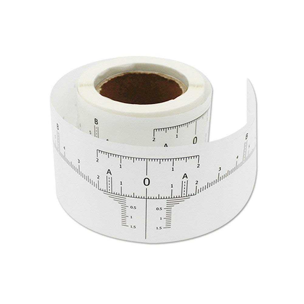 Eyebrow mapping ruler roll showing flexible measuring tool with clear markings