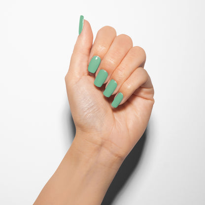 hand with Gelish Mint Of Spring on the nails