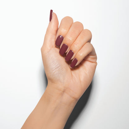 hand with Gelish Exhale on the nails
