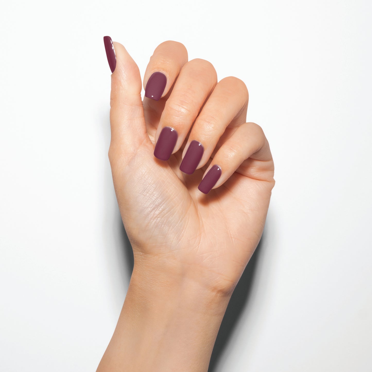 hand with Gelish Figure 8's & Heartbreaks on the nails