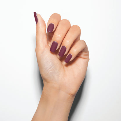 hand with Gelish Figure 8's & Heartbreaks on the nails