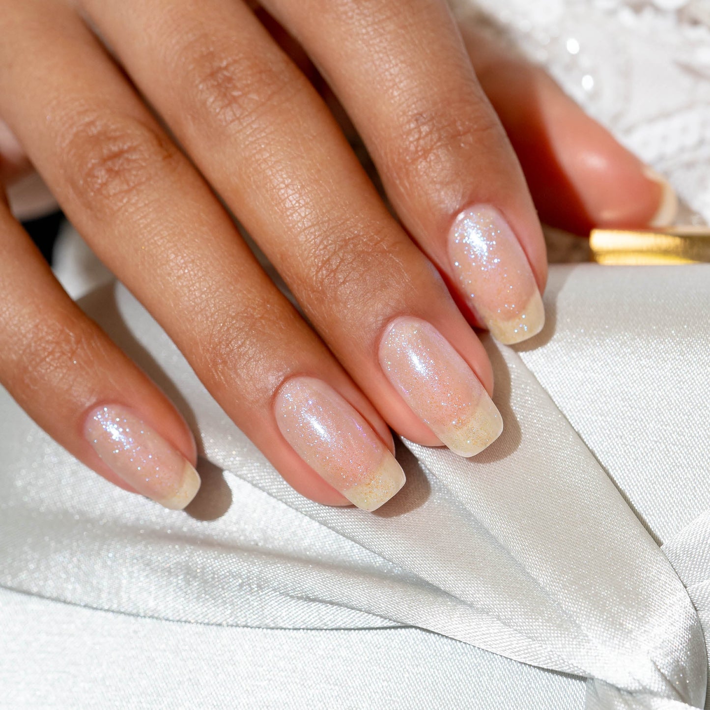 hand with Gelish Izzy Wizzy Let's Get busy on the nails
