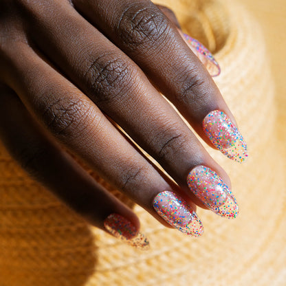 hand with Gelish Lots Of Dots on the nails