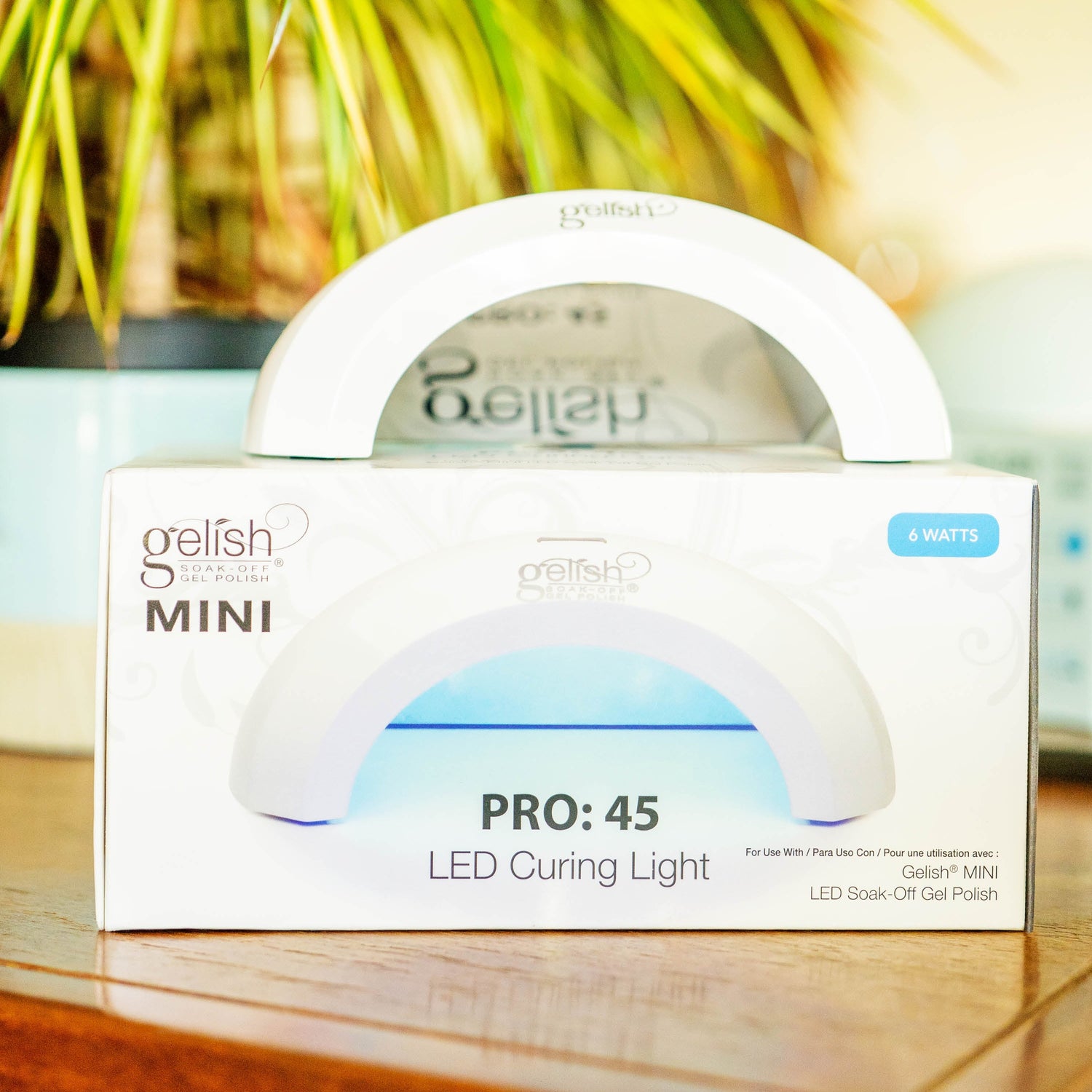 Gelish Mini Pro45 portable LED nail lamp with compact 6W curing light displayed on its retail packaging, ideal for mobile nail technicians and gel polish services.