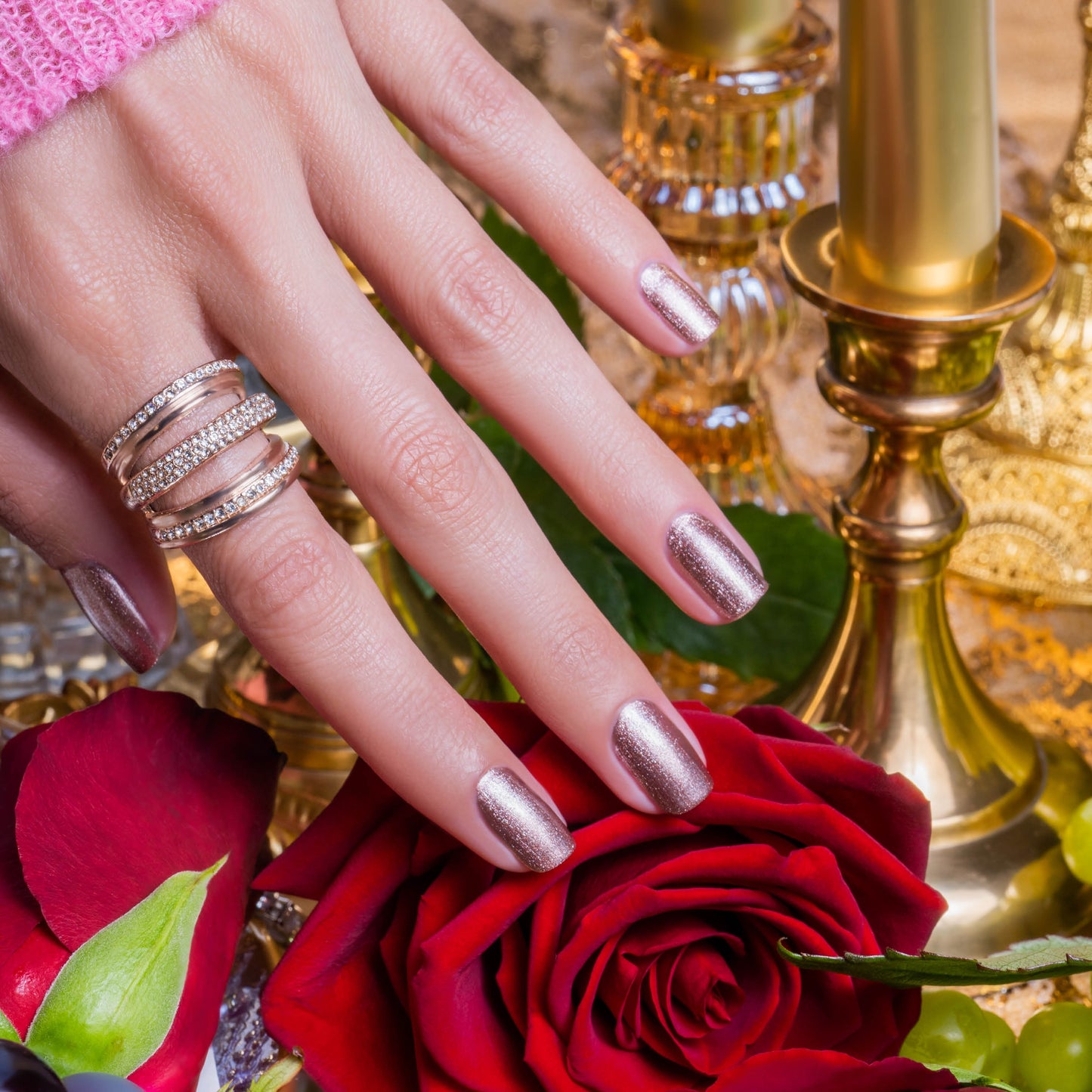 hand with Gelish No Way Rose on the nails