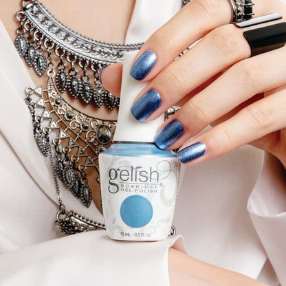 hand with Gelish Rhythm & Blues on the nails