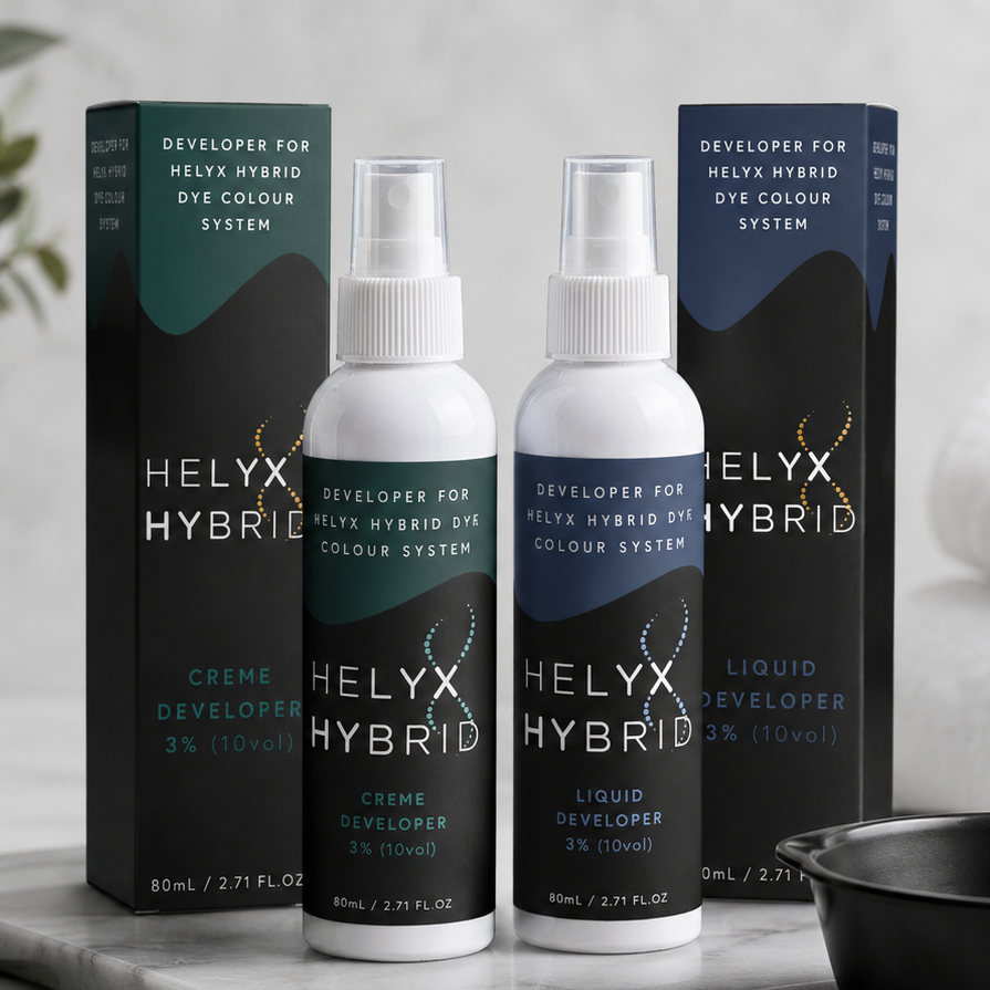 Helyx Hybrid Creme Developer and Liquid Developer lifestyle image with professional lash and brow tinting accessories in a modern salon setting