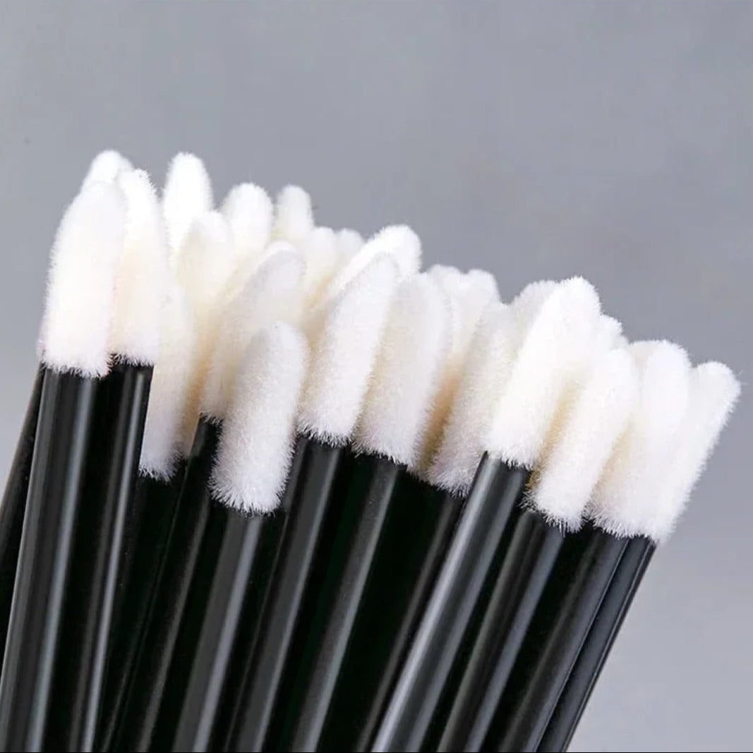 Close up of Lint-free lip applicators 50 pack for hygienic gloss application and beauty use