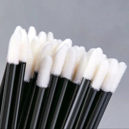 Close up of Lint-free lip applicators 50 pack for hygienic gloss application and beauty use