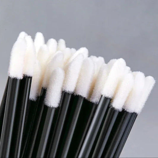 Close up of Lint-free lip applicators 50 pack for hygienic gloss application and beauty use