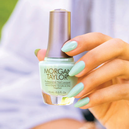 hand with Morgan Taylor A Mint of Spring on the nails