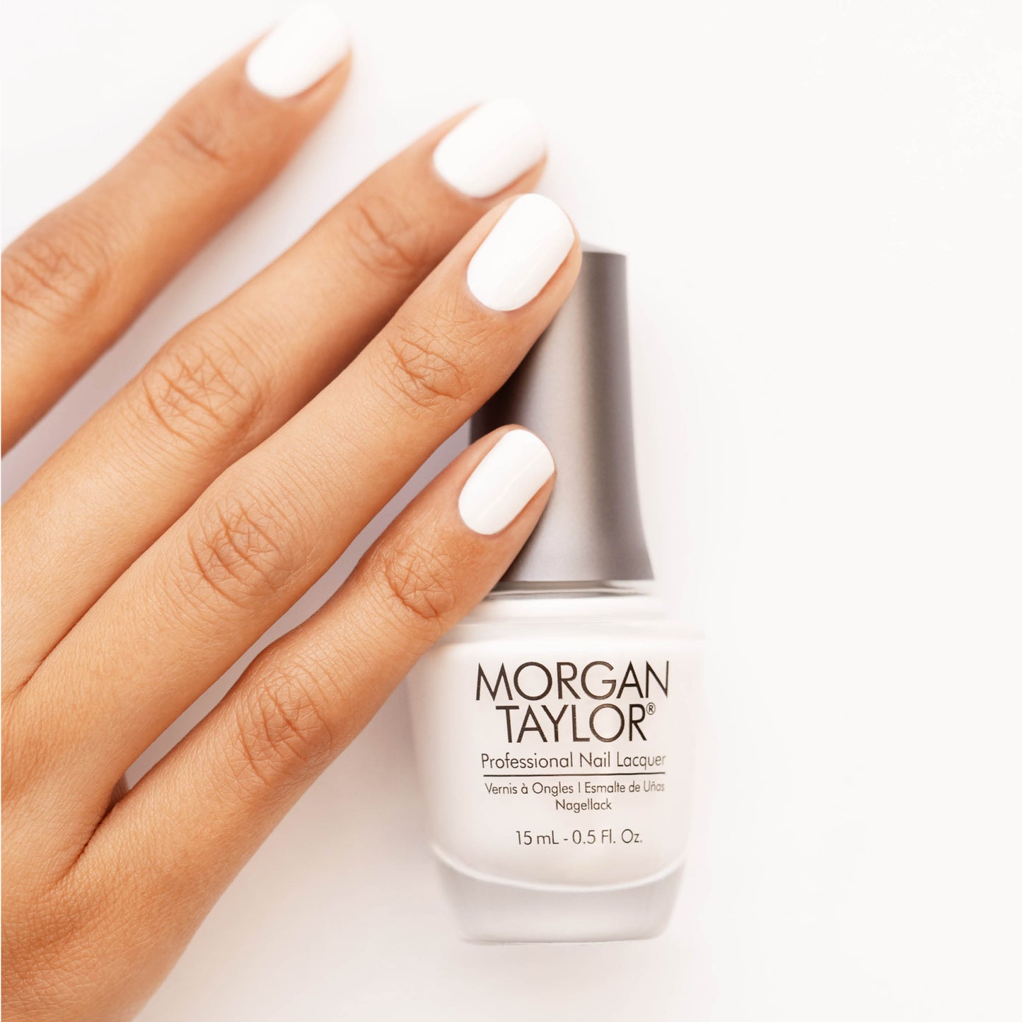 hand with Morgan Taylor Arctic Freeze on the nails
