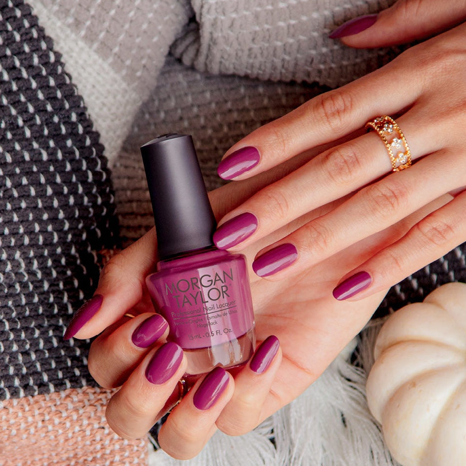 hand with Morgan Taylor Exhale on the nails