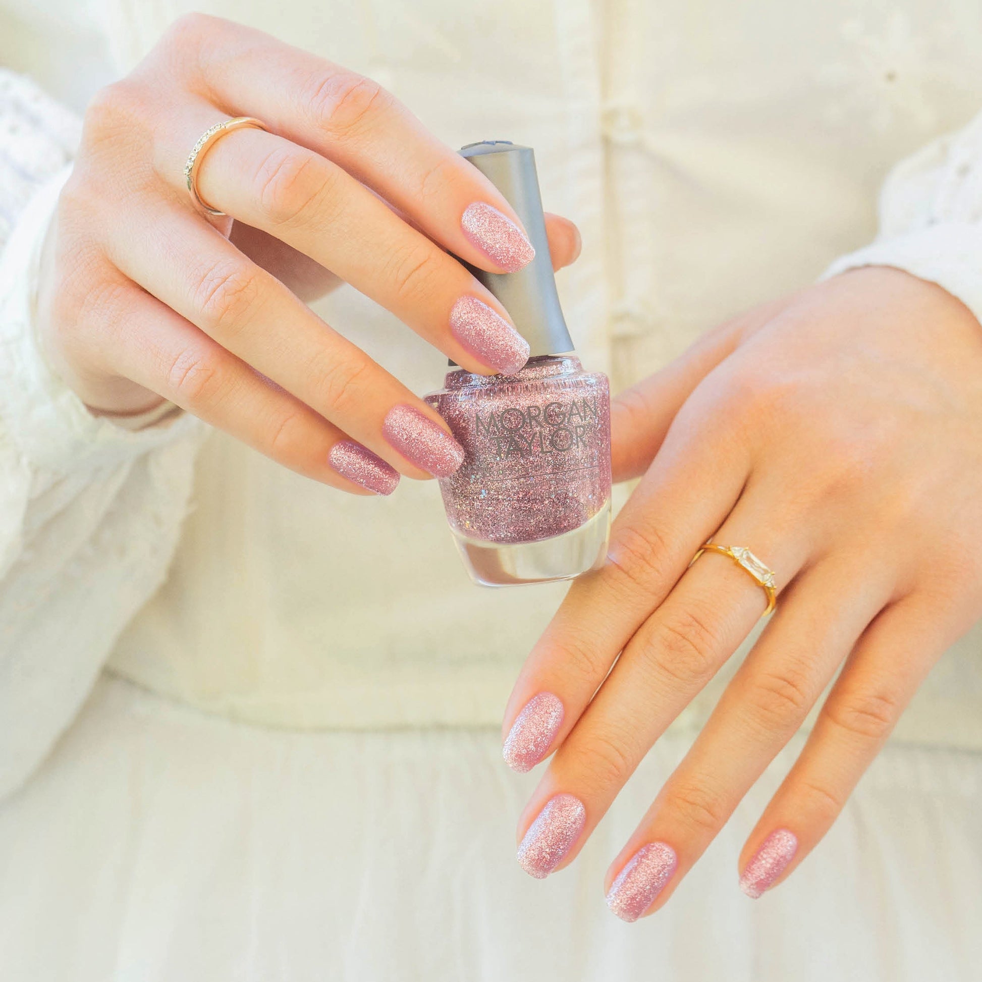 hand with Morgan Taylor June Bride on the nails