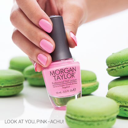 hand with Morgan Taylor Look At You Pink-Achu on the nails