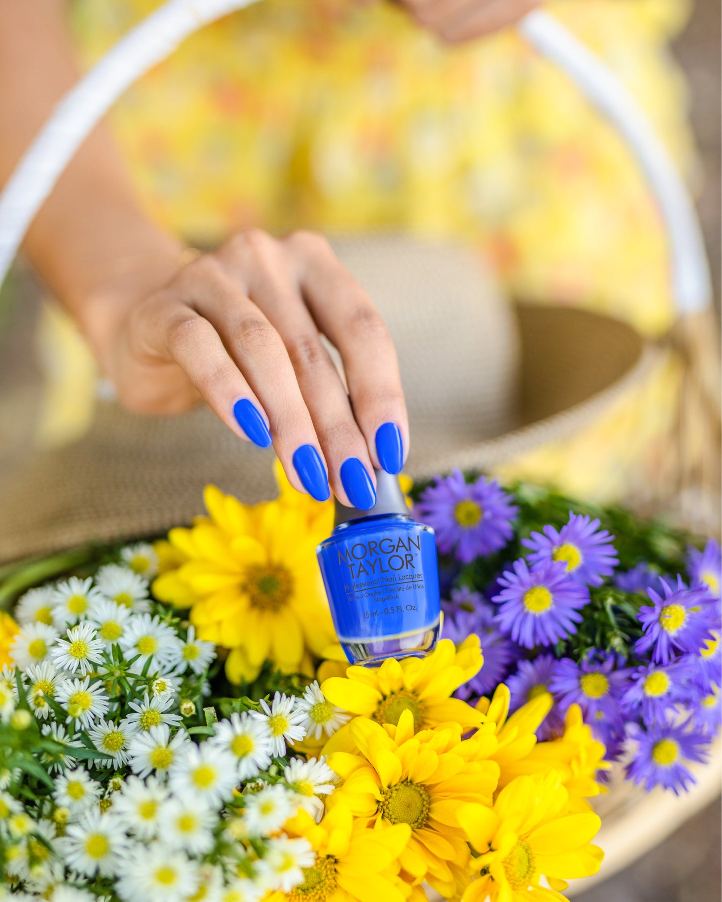 hand with Morgan Taylor Making Waves on the nails