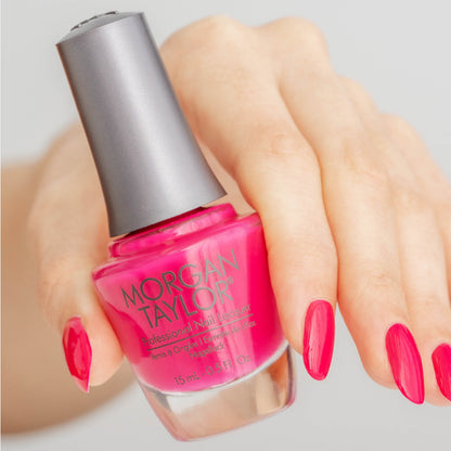 hand with Morgan Taylor Prettier in Pink on the nails