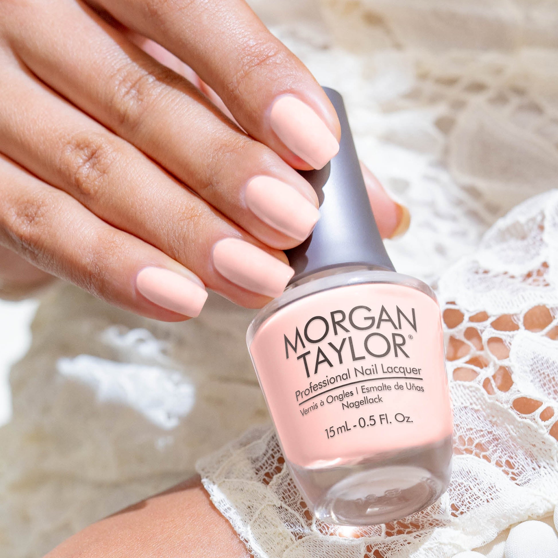 hand with Morgan Taylor Simply irresistible on the nails