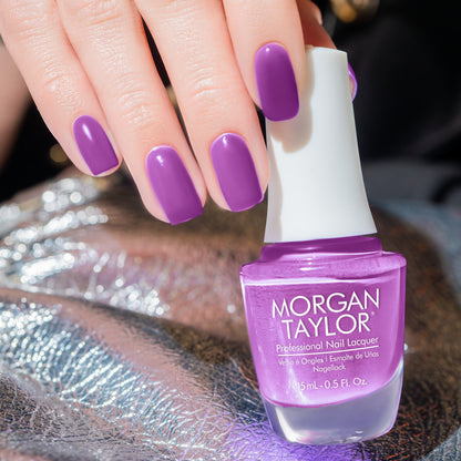 hand with Morgan Taylor Tokyo A Go Go on the nails