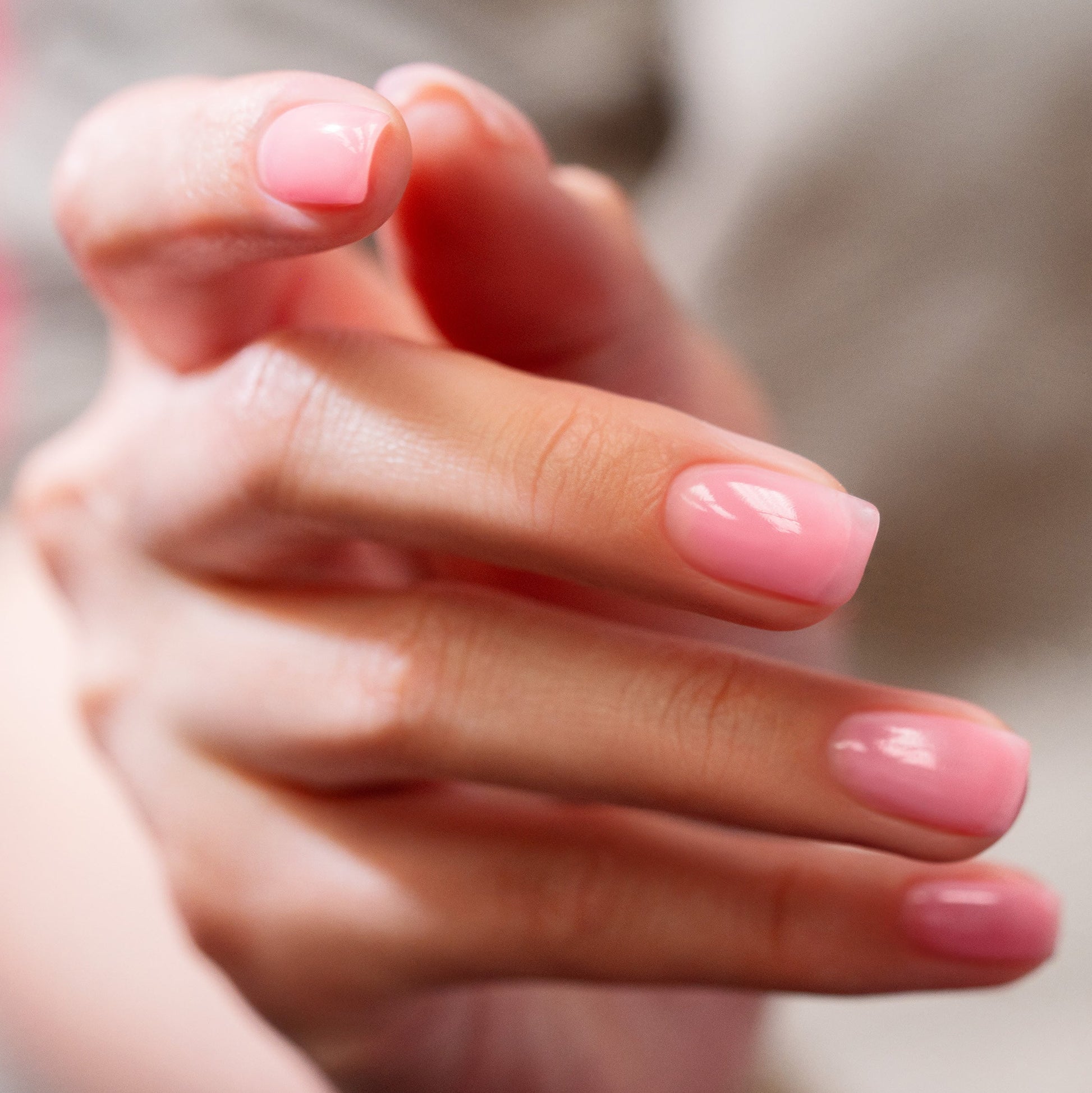 hand with Morgan Taylor Tutu's & Tights on the nails