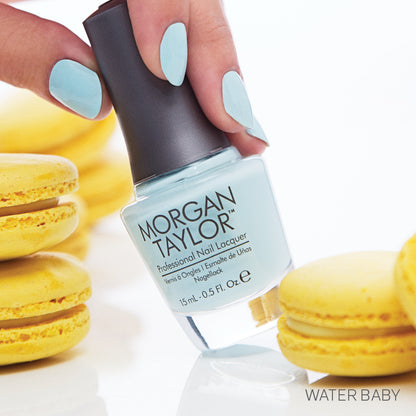 hand with Morgan Taylor Water Baby on the nails