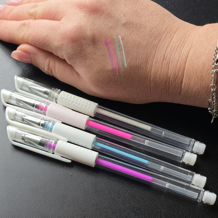Professional skin mapping pens with visible colour swatches on skin for brow mapping, PMU outlining and beauty services