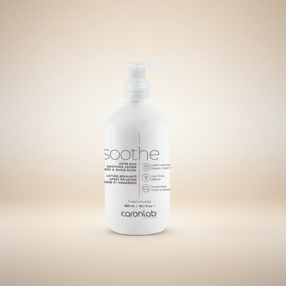 White bottle of Caronlab soothe after waxing lotion in mango and witch hazel product